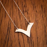 Håndlaget sølvsmykke. Design: Måke