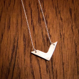 Håndlaget sølvsmykke. Design: V