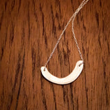 Håndlaget sølvsmykke. Design: Smil