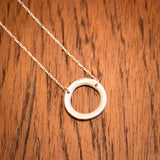 Håndlaget sølvsmykke. Design: Rund (lite)