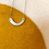 Håndlaget sølvsmykke. Design: Smil