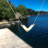 Håndlaget sølvsmykke. Design: V