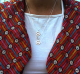 Håndlaget sølvsmykke. Design: Fred. Smykke i to lengder