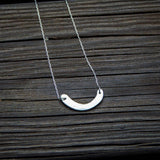 Håndlaget sølvsmykke. Design: Smil