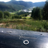 Håndlaget sølvsmykke. Design: Rund (lite). Setesdalen