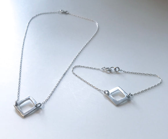 Kvadraturen - smykke og armbånd i sølv