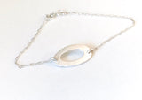 Oval - smykke og armbånd i sølv
